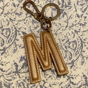 Pinkish gold M key chain